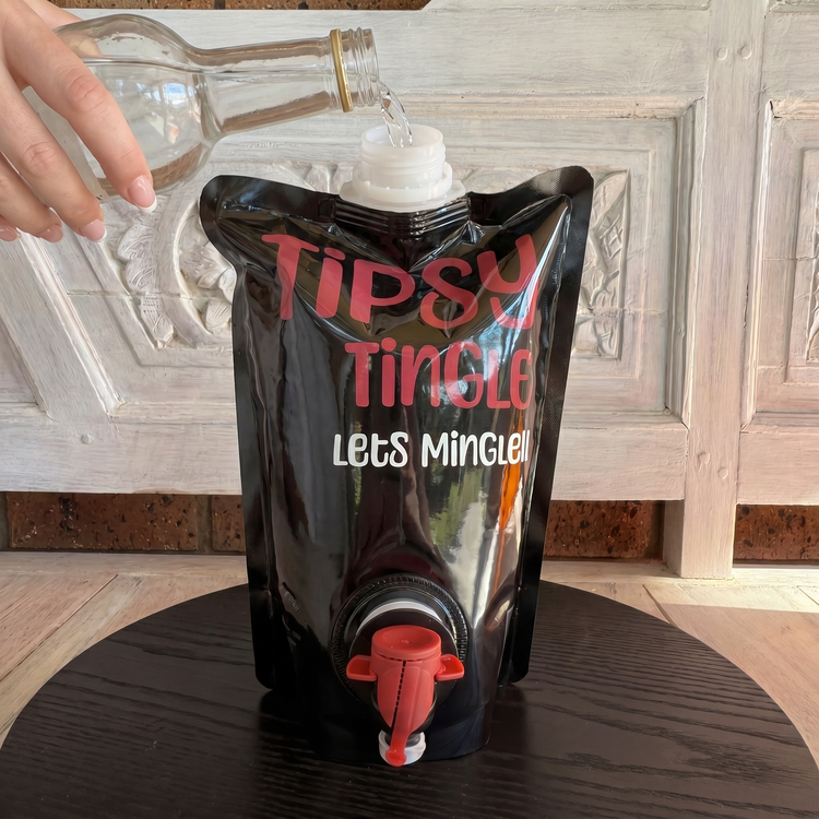 pouring soda water into the pre-mixed bag