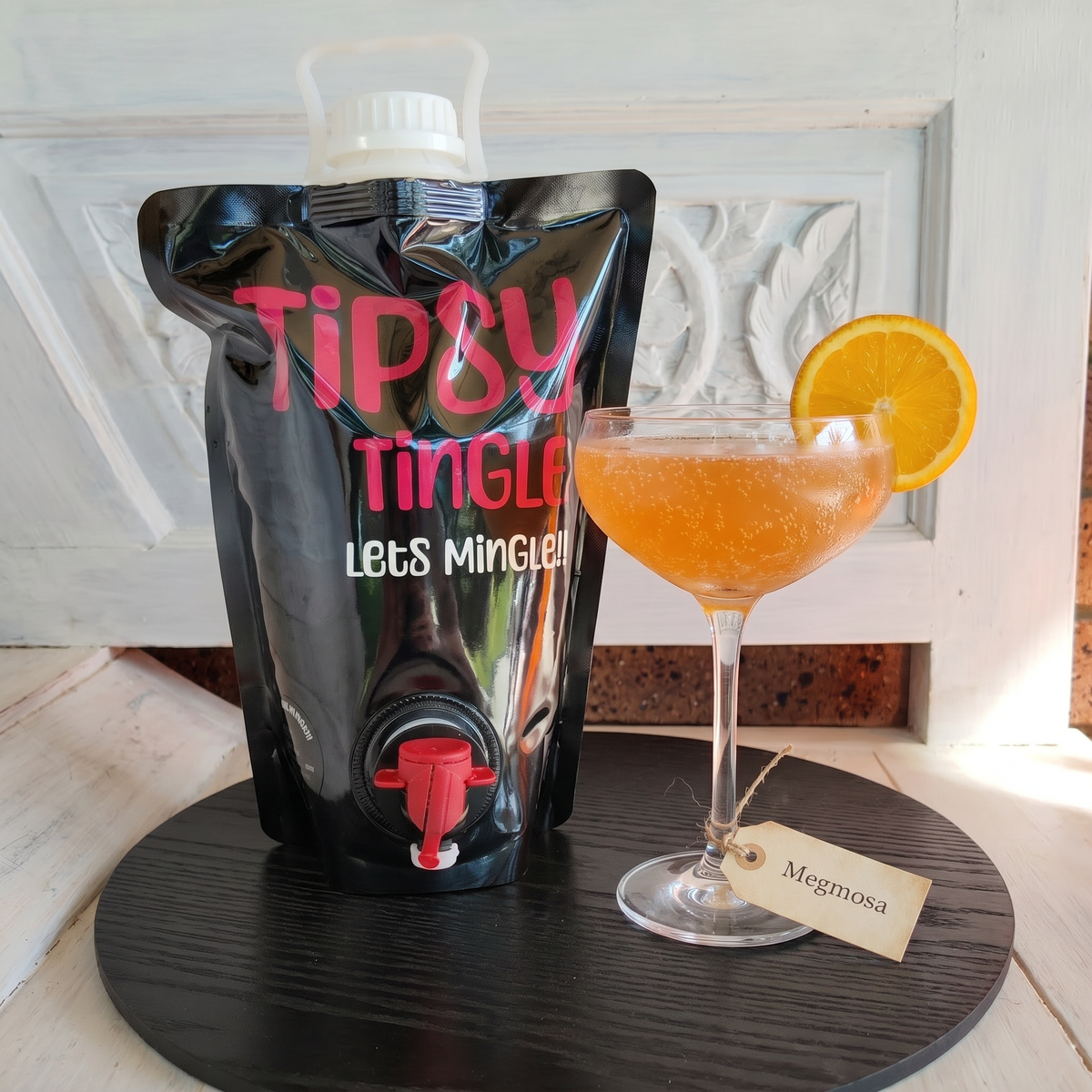 Megmosa Mimosa Cocktail Party Bag with sparkling cocktail
