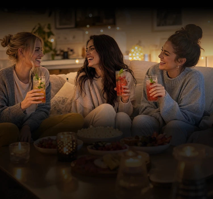 people enjoying drinks together in a cozy setting